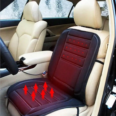 Black heated car seat cushion with red warming indicators installed in beige vehicle interior